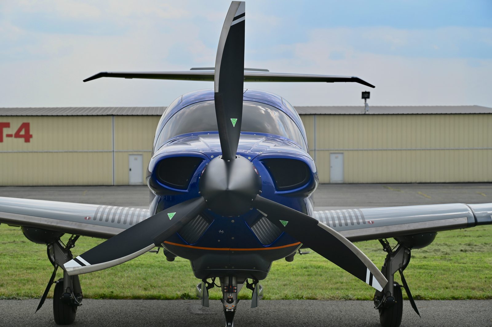 Head-on view of a blue Diamond single parked on the ramp