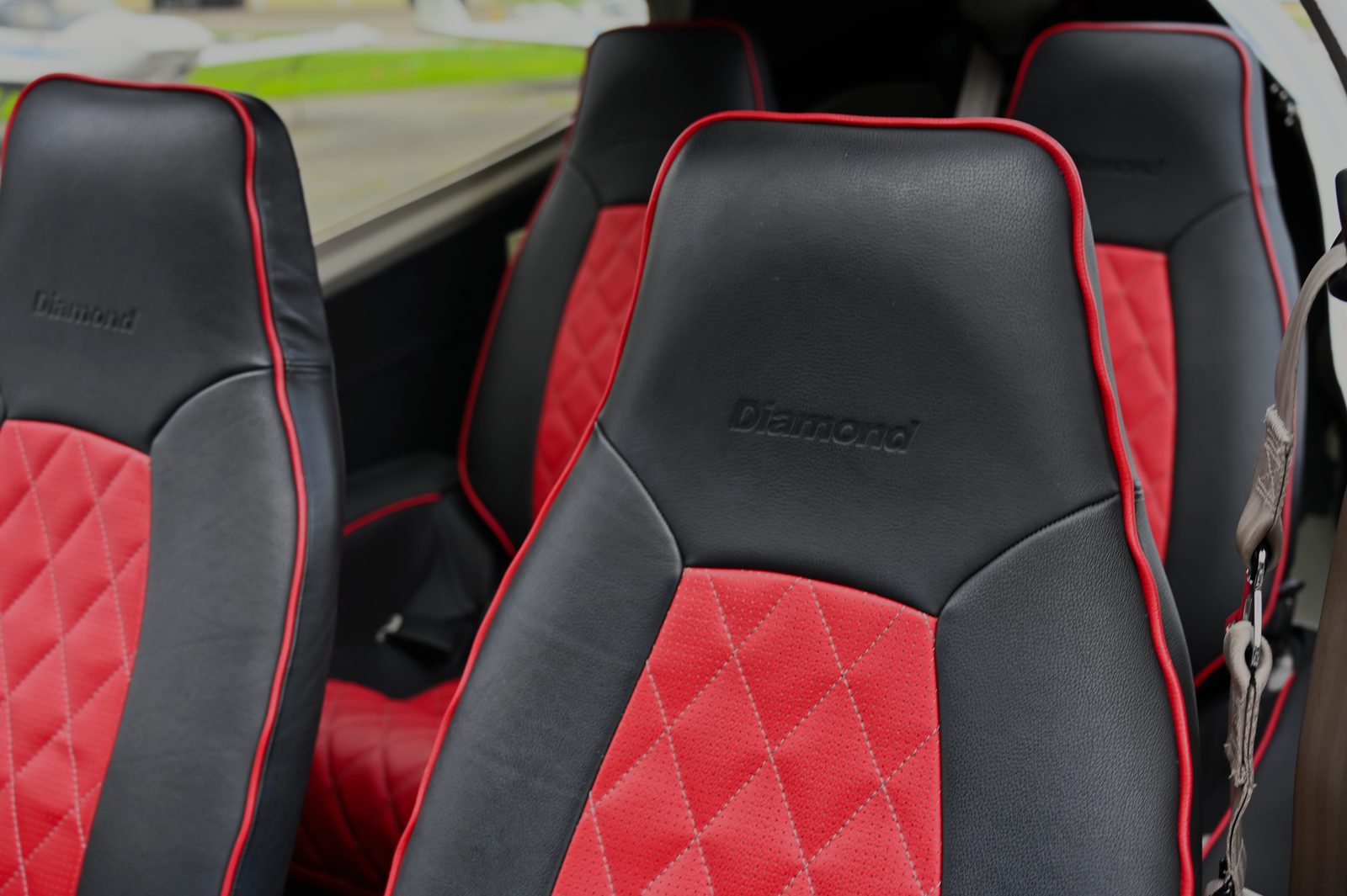 Quilted red leather seats in a Diamond twin cabin